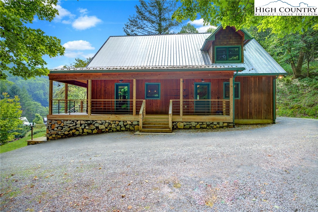 568 Auborn Trivette Road Sugar Grove, NC 28679 - Photo 5 of 29 front view of a house with a yard