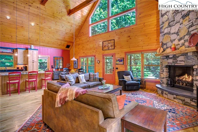 a outdoor space with patio furniture and a fireplace