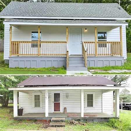 a front view of a house with a garden and yard