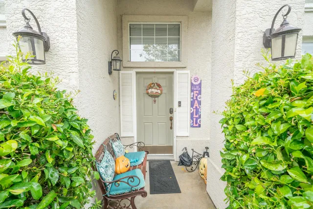view of front door of house with outdoor seating