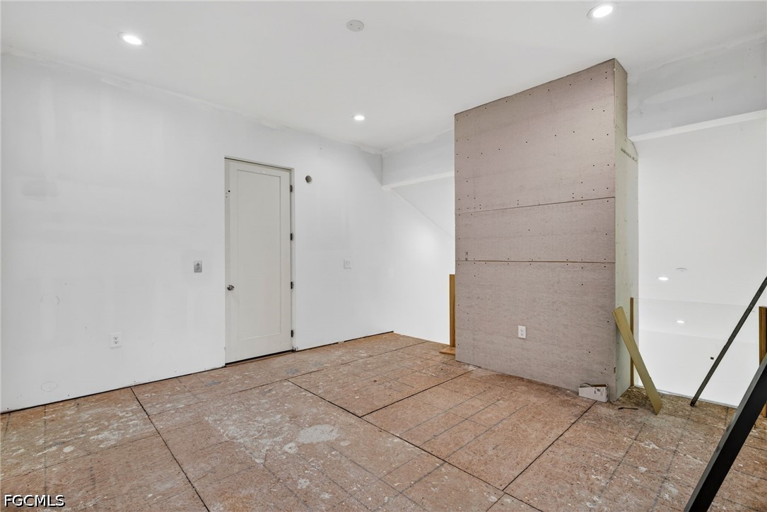 2665 Oil Well Road Naples, FL 34120 - Photo 13 of 40 a view of an empty room