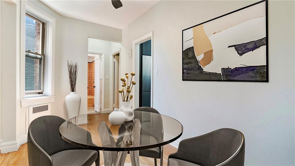 1560 East 18th Street, Unit 3D Brooklyn, NY 11230 - Photo 6 of 10 a dining room with furniture and window