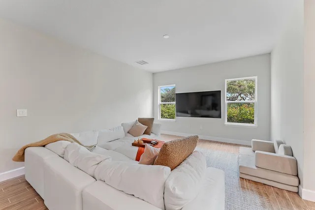 an aerial view of a house with a garden