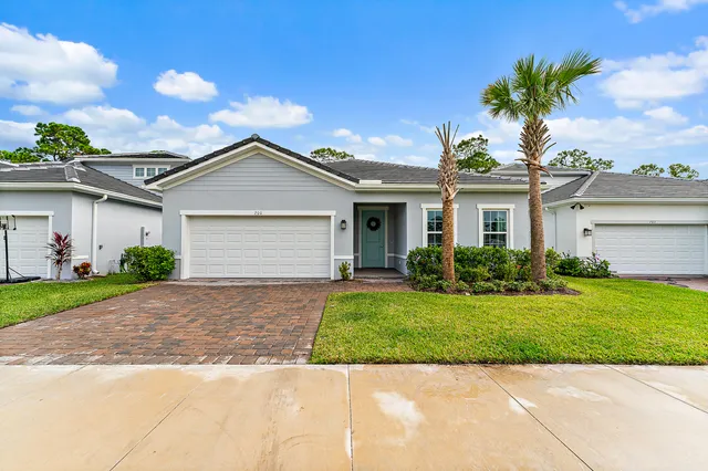 a view of a livingroom with furniture and wooden floor