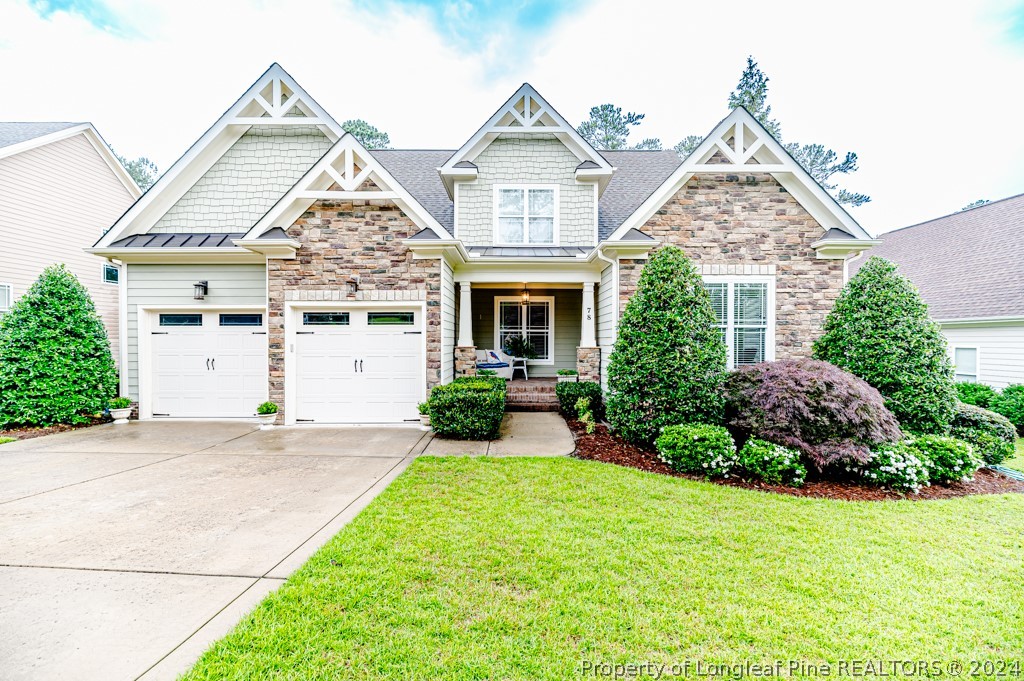 78 Spring Pond Lane Spring Lake, NC 28390 - Photo 1 of 46 front view of a house with a yard