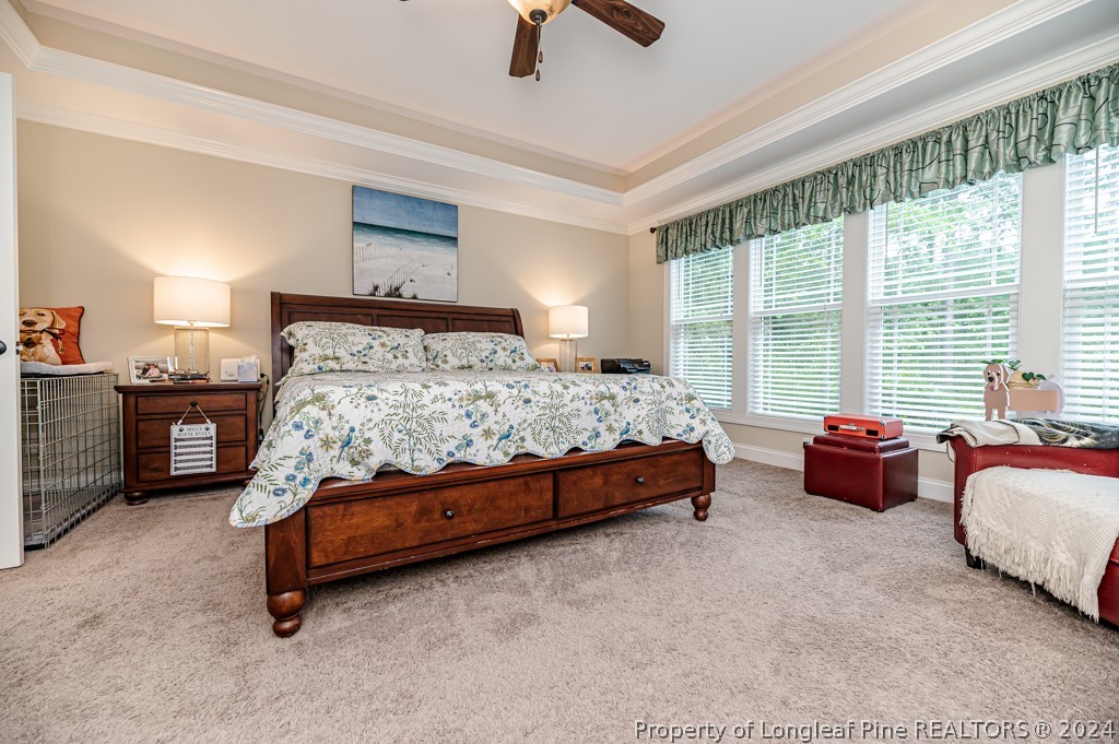 78 Spring Pond Lane Spring Lake, NC 28390 - Photo 24 of 46 a bedroom with bed and a couch