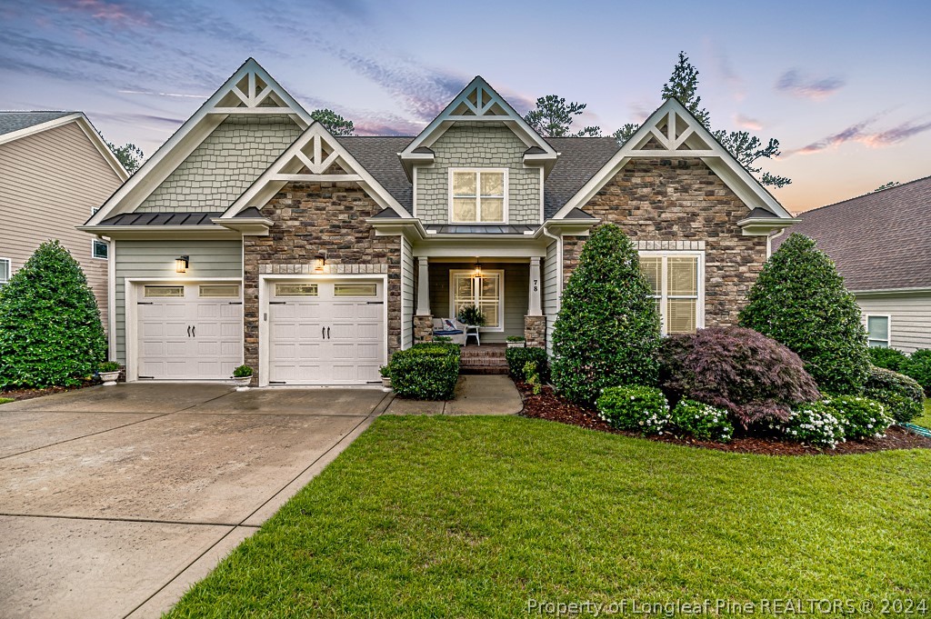 78 Spring Pond Lane Spring Lake, NC 28390 - Photo 3 of 46 front view of a house with a yard