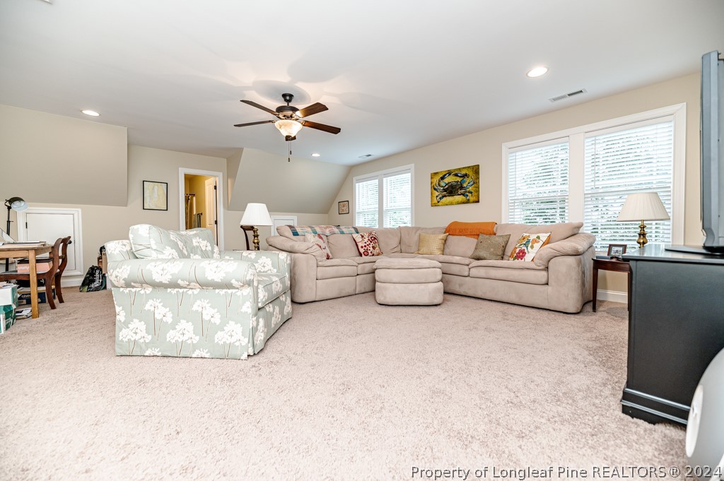 78 Spring Pond Lane Spring Lake, NC 28390 - Photo 32 of 46 a living room with furniture and a large window