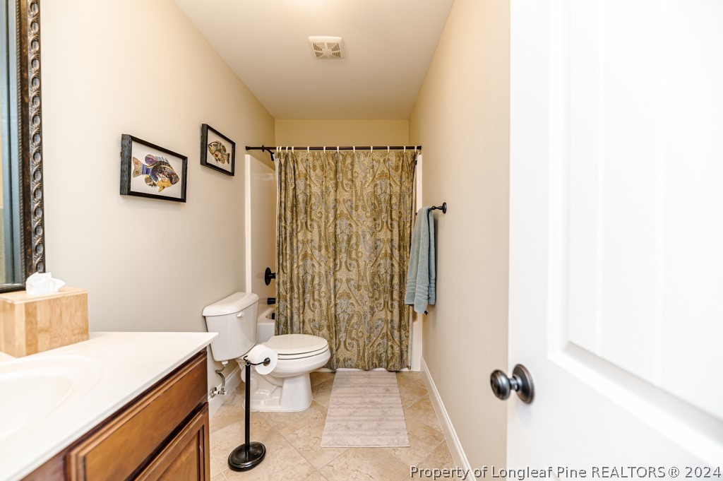 78 Spring Pond Lane Spring Lake, NC 28390 - Photo 35 of 46 a bathroom with a sink toilet and shower