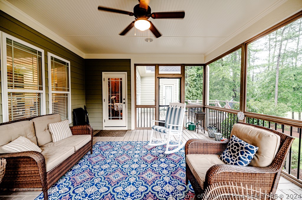 78 Spring Pond Lane Spring Lake, NC 28390 - Photo 39 of 46 a living room with furniture and a large window