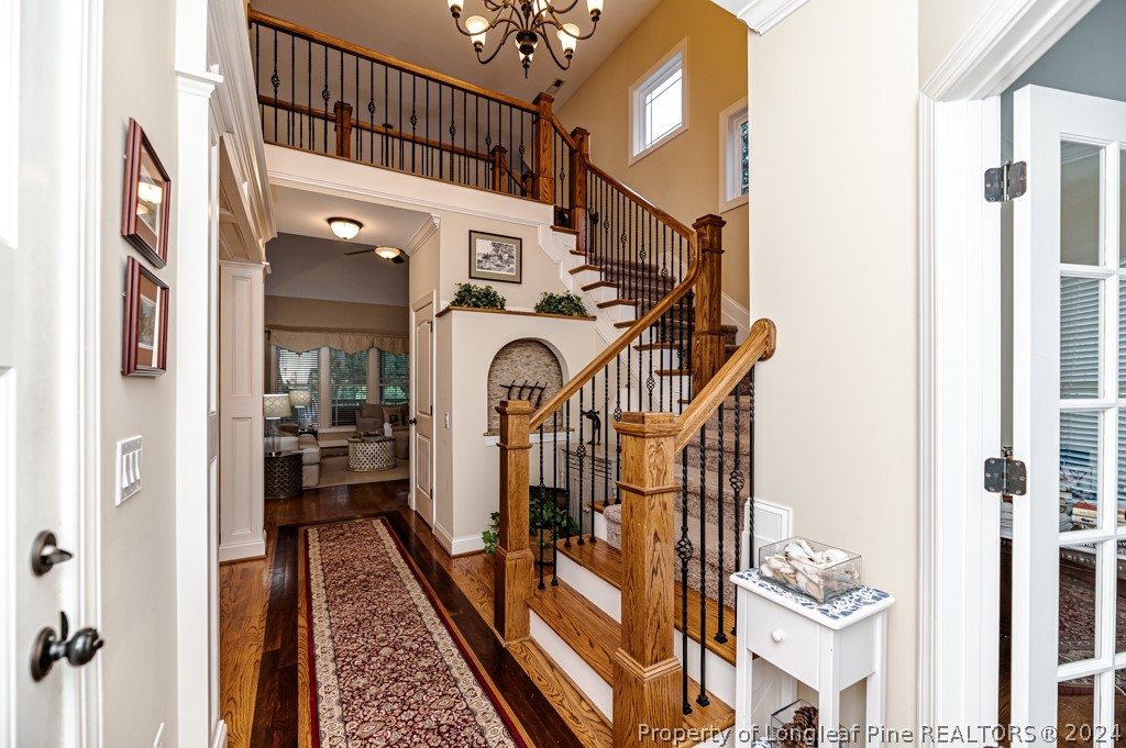 78 Spring Pond Lane Spring Lake, NC 28390 - Photo 4 of 46 a view of a hallway with a hardwood floor