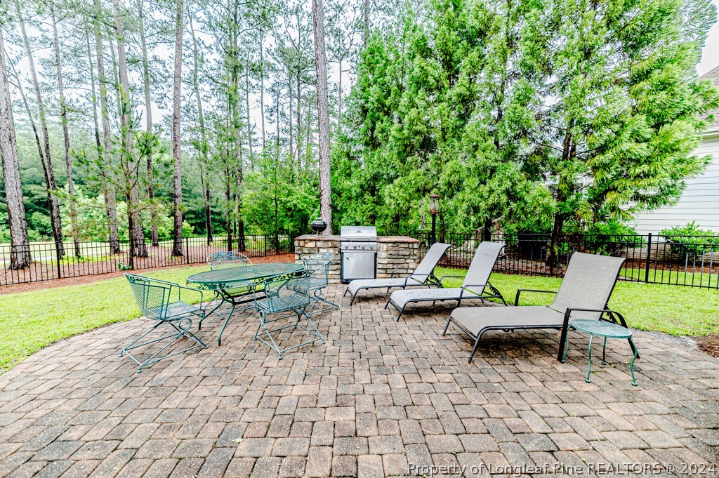78 Spring Pond Lane Spring Lake, NC 28390 - Photo 43 of 46 a view of a two chairs in a park