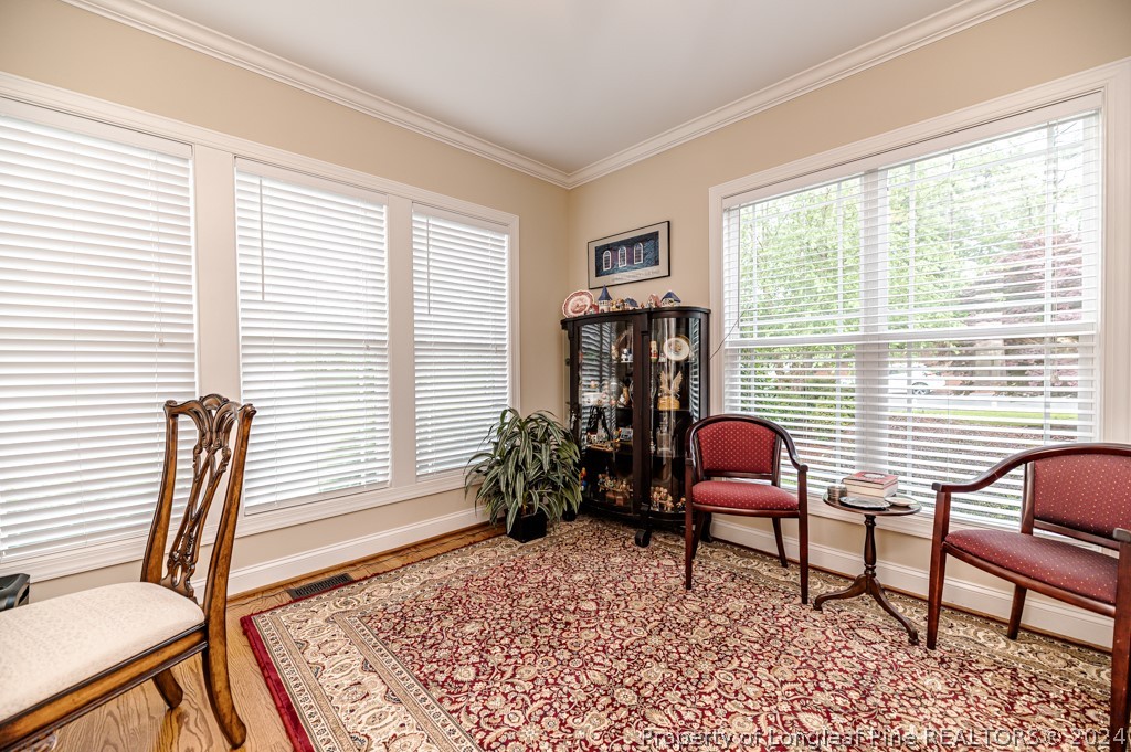 78 Spring Pond Lane Spring Lake, NC 28390 - Photo 7 of 46 a living room with furniture and a window