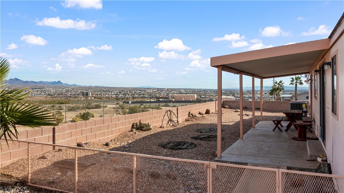 1609 Cajon Court Laughlin, NV 89029 - Photo 60 of 69 Fenced backyard featuring a mountain view and a patio