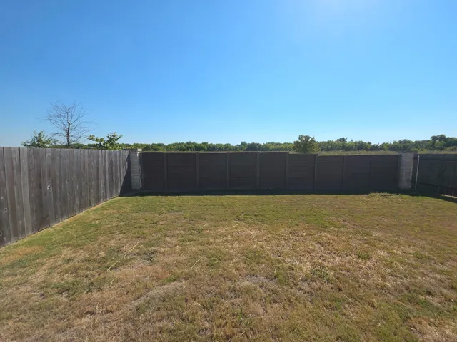 a view of outdoor space and yard