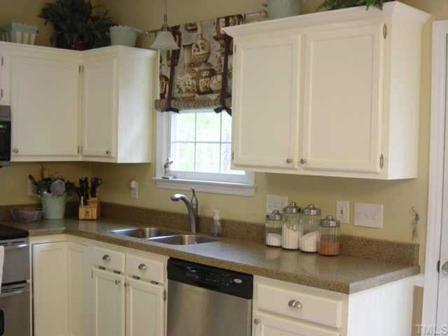 5252 Fairmead Circle Raleigh, NC 27613 - Photo 3 of 12 The kitchen has been updated with lovely, granite transformation countertops with undermount stainless steel sink. Cabinets feature new crown, baseboard and beadboard moldings, as well as new hardware for an updated look. Other