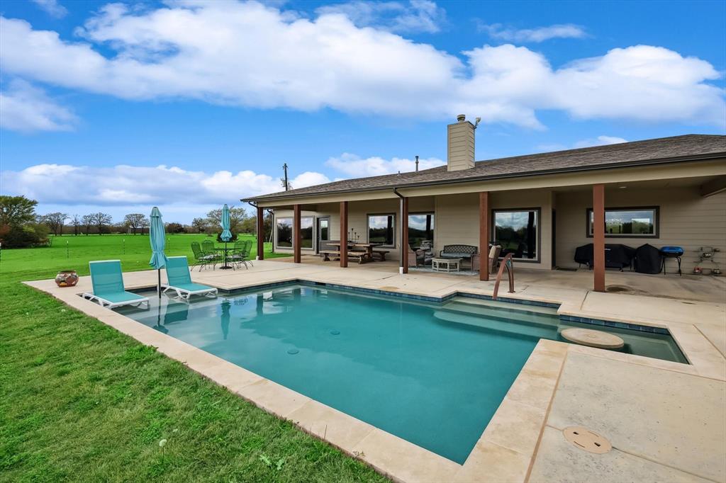 812 McKenzie Road Collinsville, TX 76233 - Photo 25 of 40 a view of a house with pool table and chairs