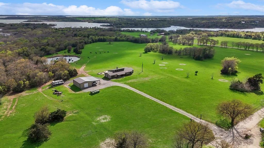812 McKenzie Road Collinsville, TX 76233 - Photo 35 of 40 a view of a lake with a city