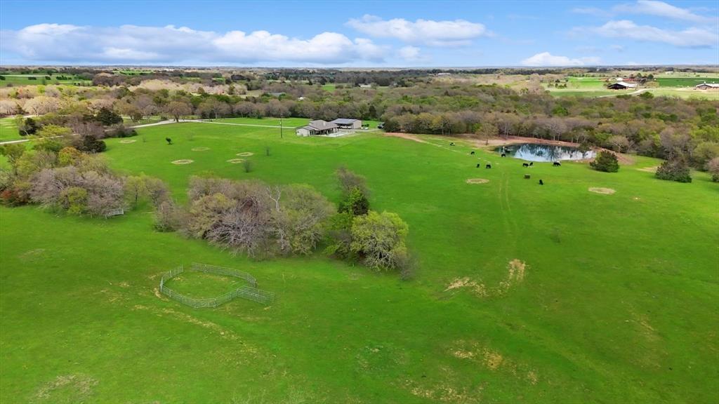 812 McKenzie Road Collinsville, TX 76233 - Photo 36 of 40 a view of a city with lush green forest
