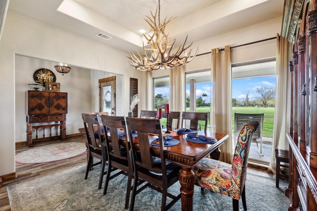 812 McKenzie Road Collinsville, TX 76233 - Photo 5 of 40 a view of a dining room with furniture window and outside view