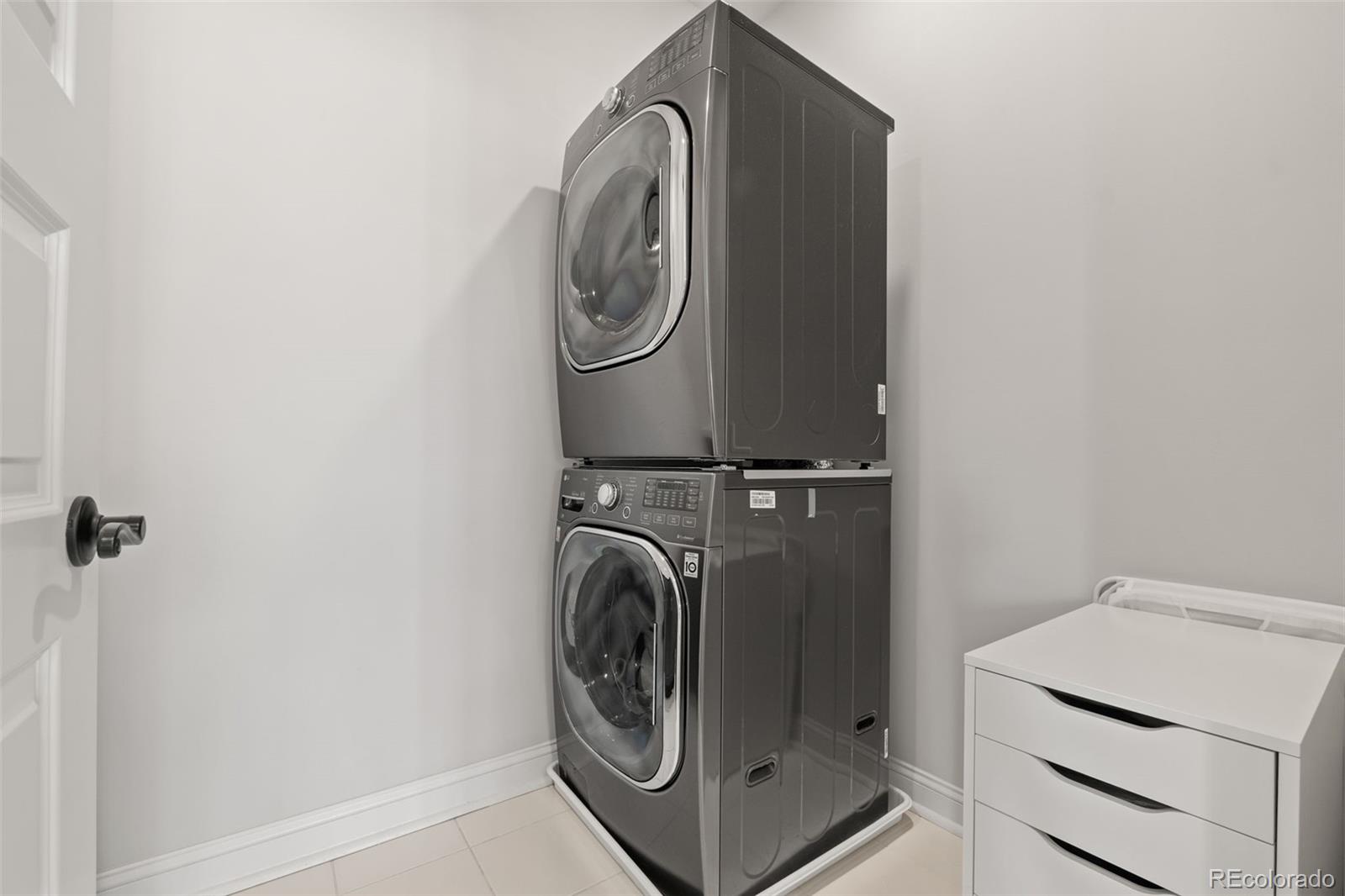 6003 Chester Way Denver, CO 80238 - Photo 26 of 43 a utility room with dryer and washer