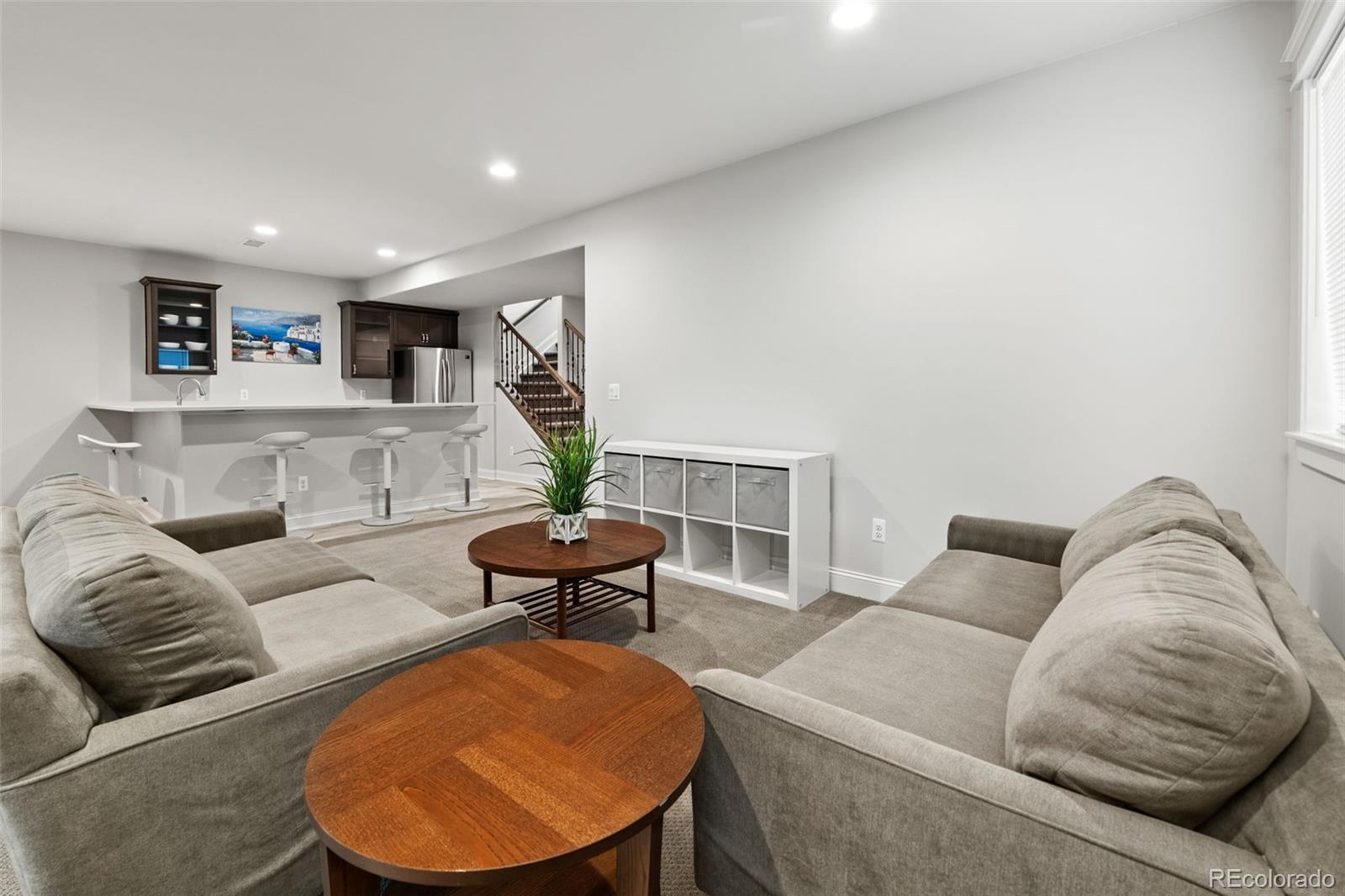 6003 Chester Way Denver, CO 80238 - Photo 29 of 43 a living room with furniture and a table