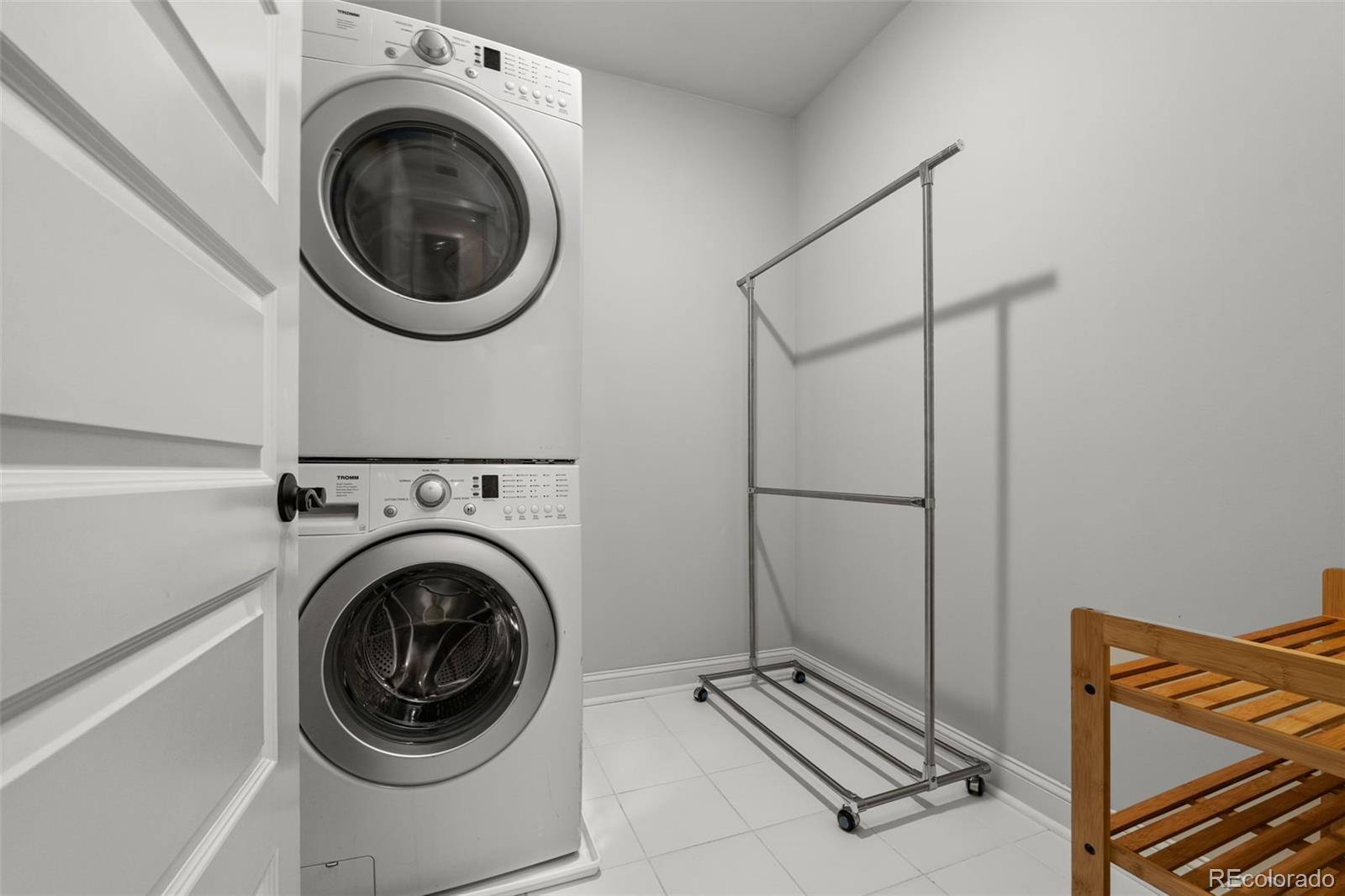 6003 Chester Way Denver, CO 80238 - Photo 33 of 43 a utility room with dryer and washer