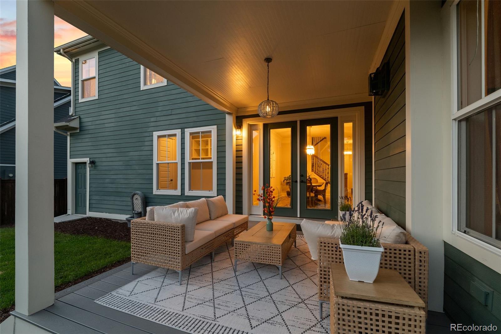 6003 Chester Way Denver, CO 80238 - Photo 4 of 43 a living room with furniture and a floor to ceiling window