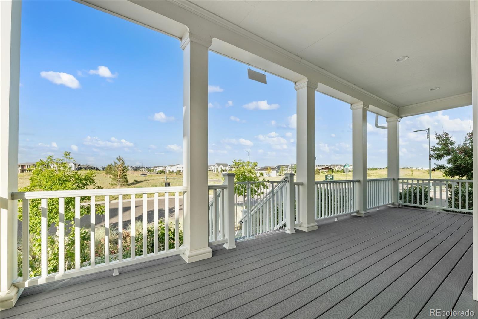 6003 Chester Way Denver, CO 80238 - Photo 43 of 43 a view of balcony with wooden floor