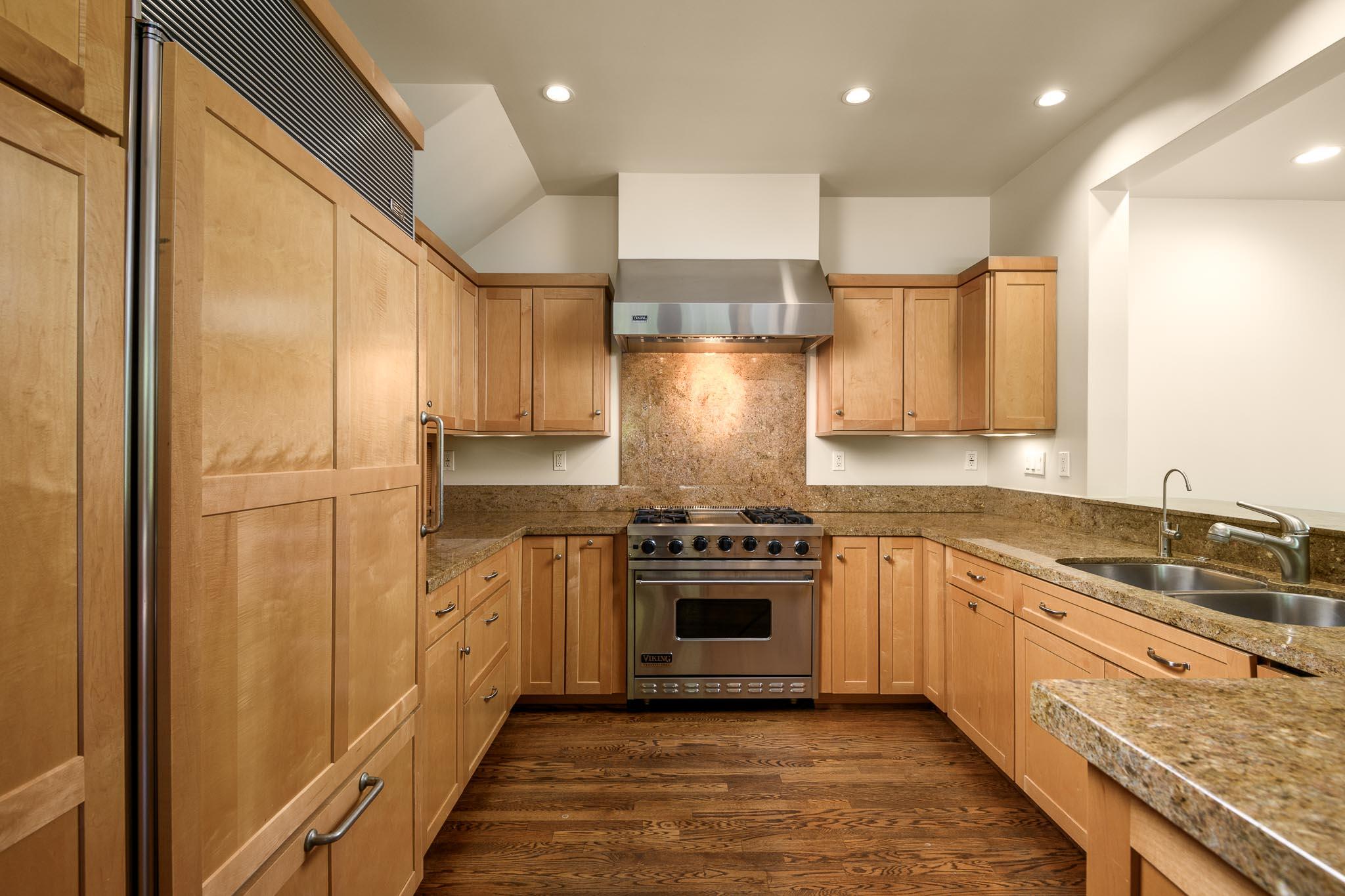 1517 East Valley Road, Unit B Montecito, CA 93108 - Photo 11 of 25 a kitchen with stainless steel appliances granite countertop a stove a sink and a refrigerator