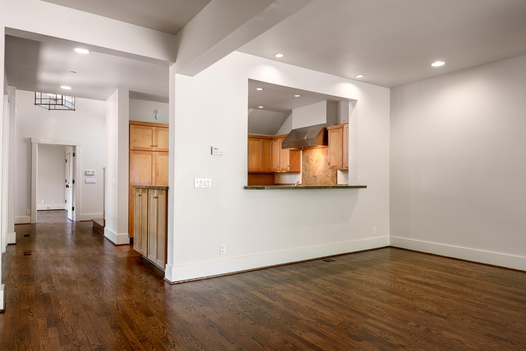 1517 East Valley Road, Unit B Montecito, CA 93108 - Photo 13 of 25 a view of a hallway with wooden floor and a cabinet