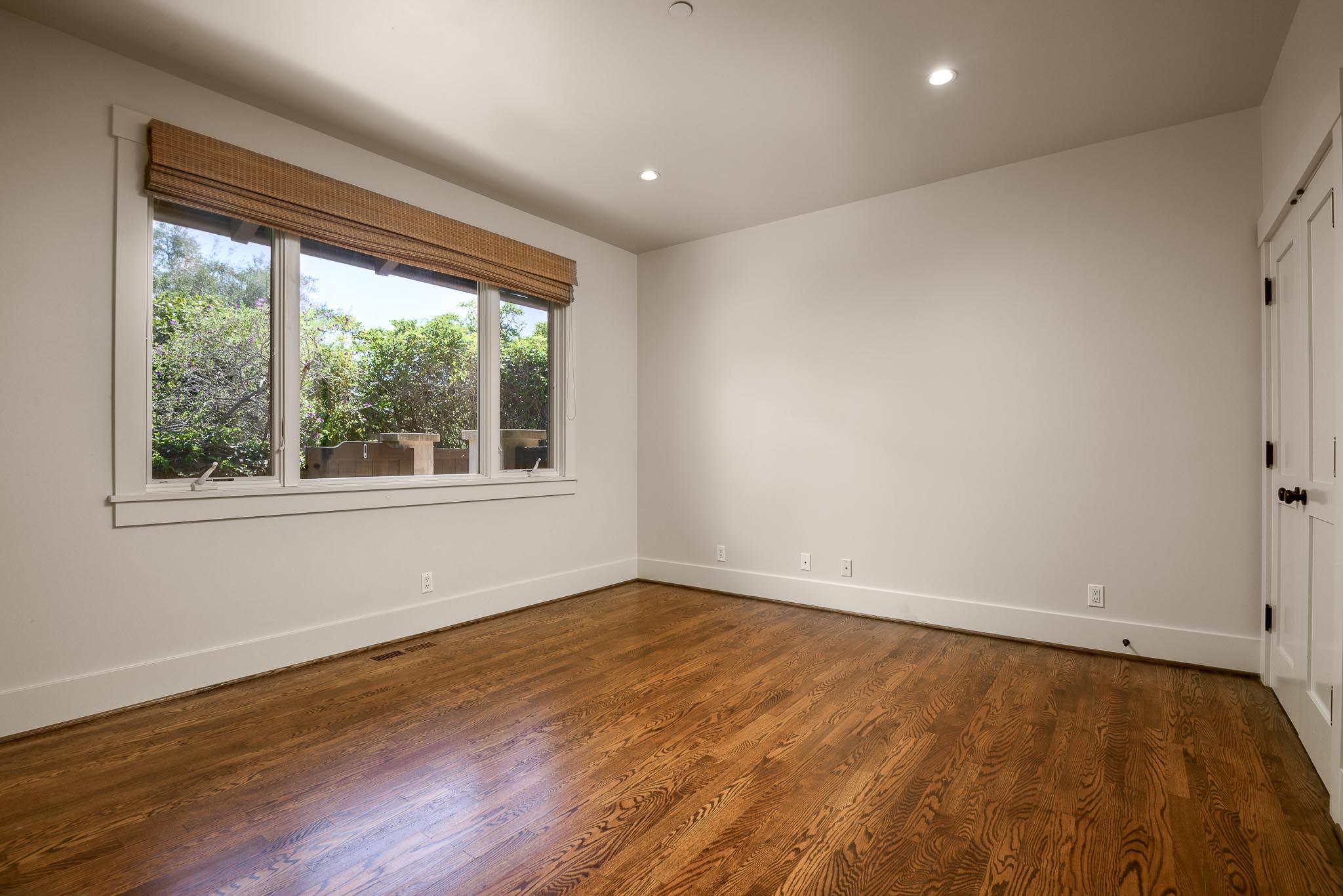 1517 East Valley Road, Unit B Montecito, CA 93108 - Photo 14 of 25 a view of empty room with wooden floor and fan