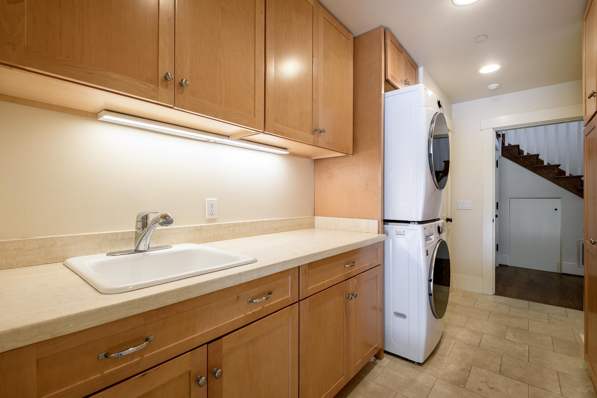 1517 East Valley Road, Unit B Montecito, CA 93108 - Photo 16 of 25 a kitchen with a sink and refrigerator