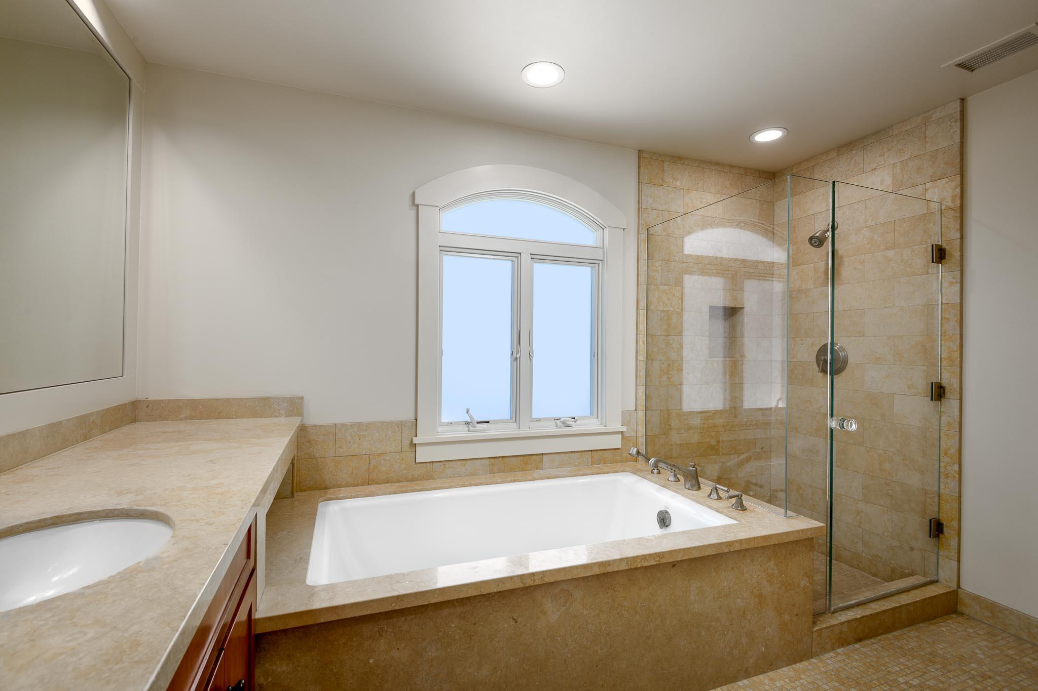 1517 East Valley Road, Unit B Montecito, CA 93108 - Photo 19 of 25 a bathroom with a tub sink and mirror