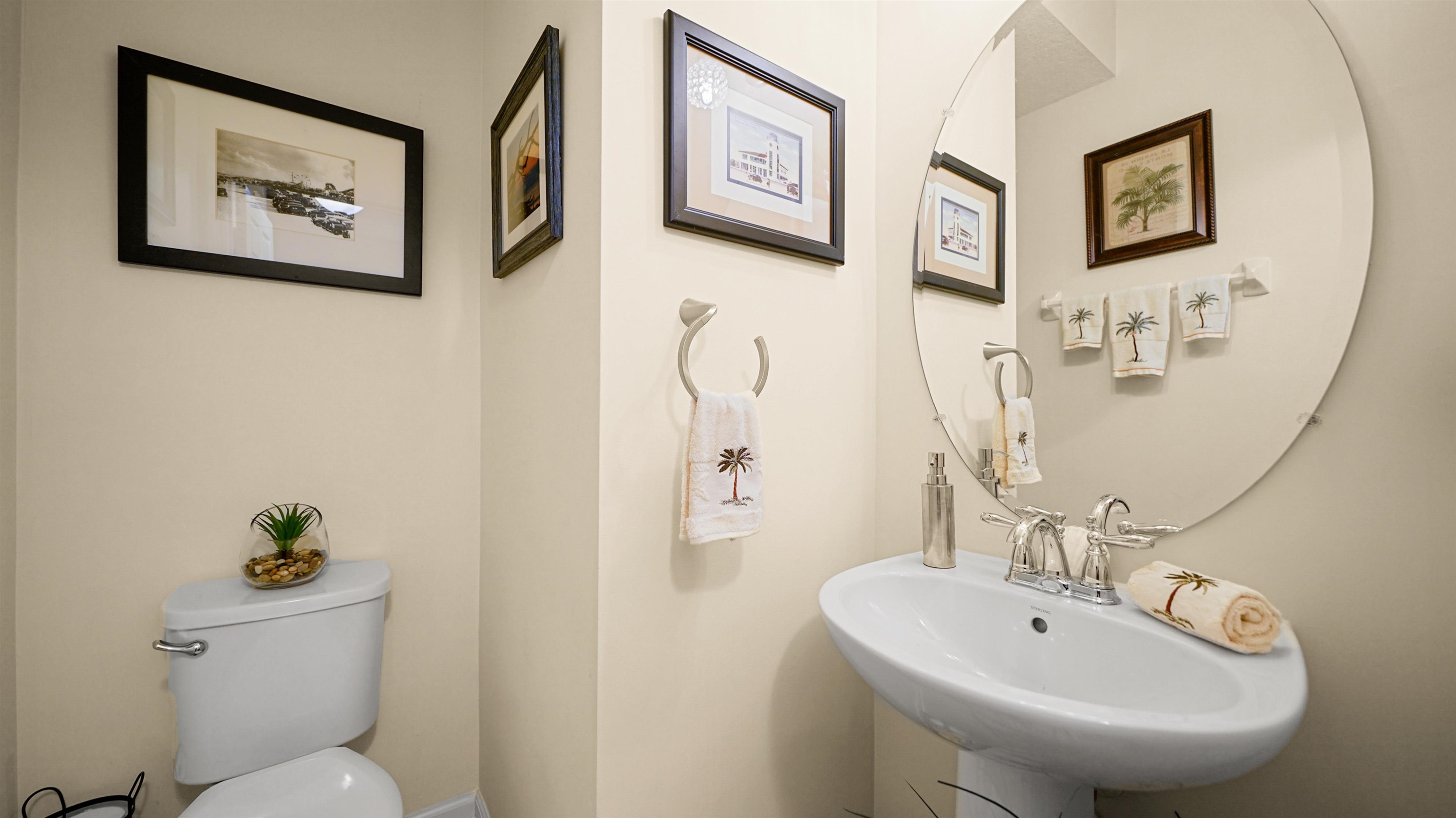 141 San Briso Way St. Augustine, FL 32092 - Photo 17 of 43 a bathroom with a toilet sink and mirror