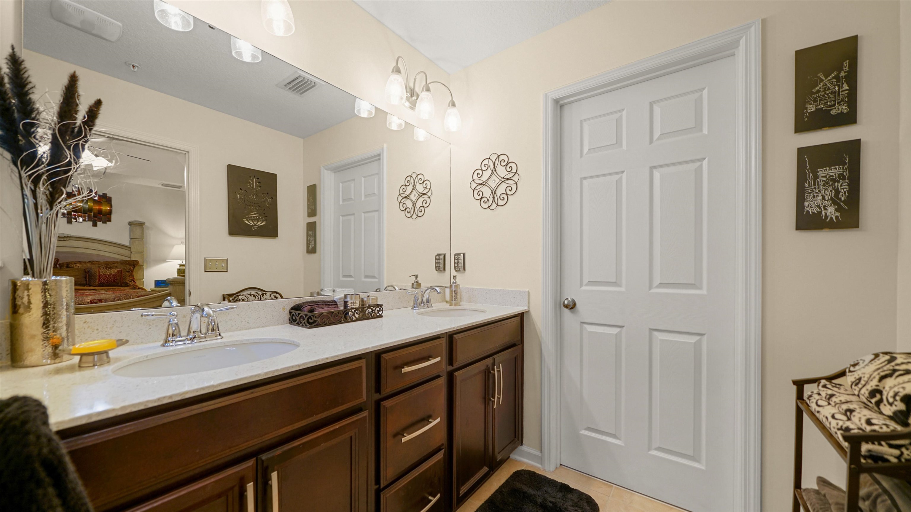 141 San Briso Way St. Augustine, FL 32092 - Photo 24 of 43 a bathroom with a sink double vanity and a mirror