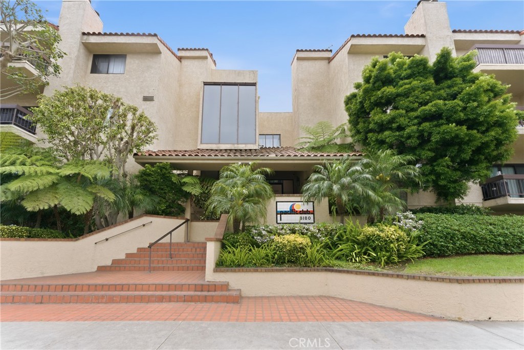8180 Manitoba Street, Unit 330 Playa del Rey, CA 90293 - Photo 31 of 31 a front view of a house with a yard