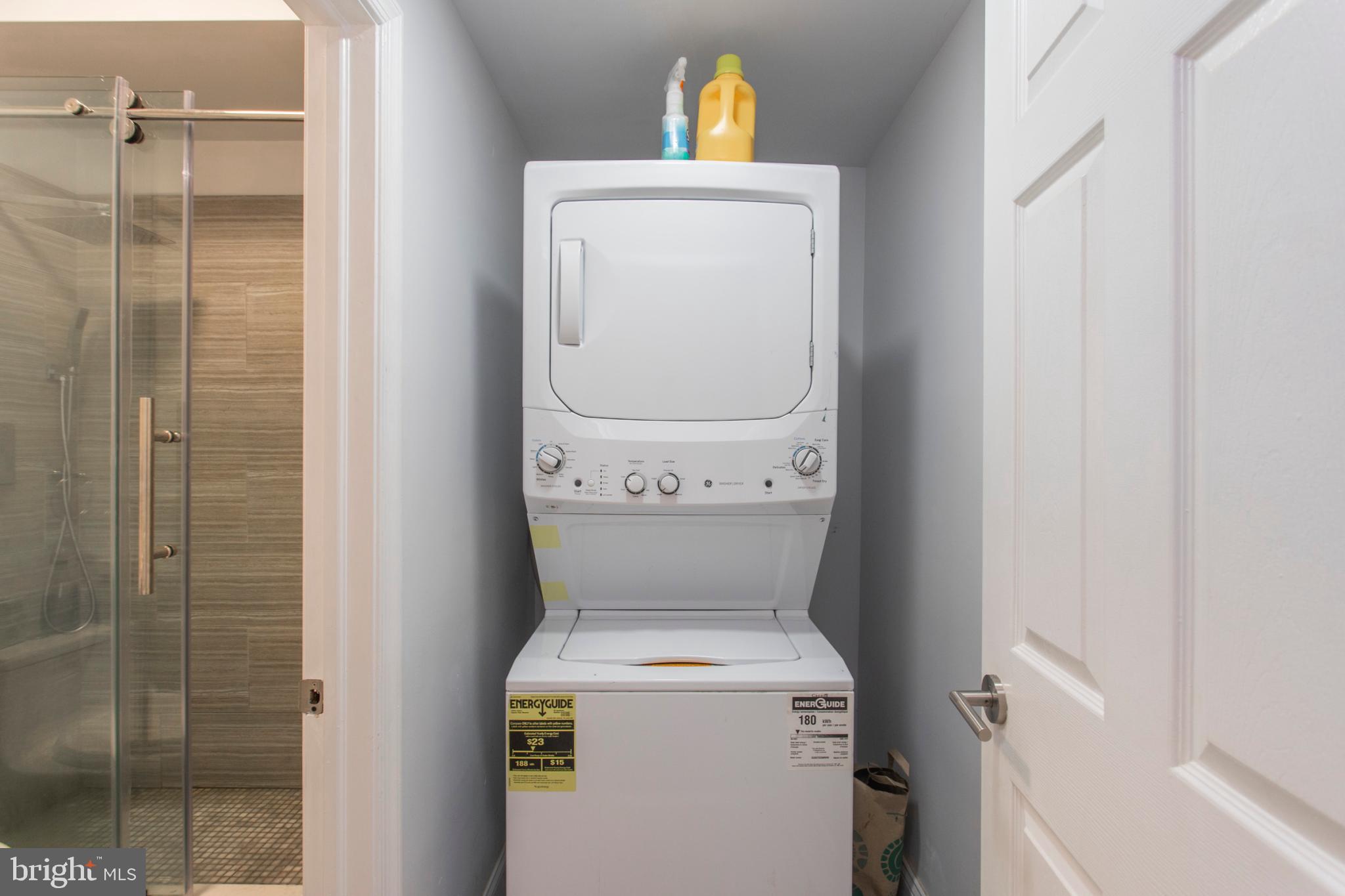 1629 Wallace Street, Unit 1R Philadelphia, PA 19130 - Photo 13 of 22 a utility room with dryer and washer