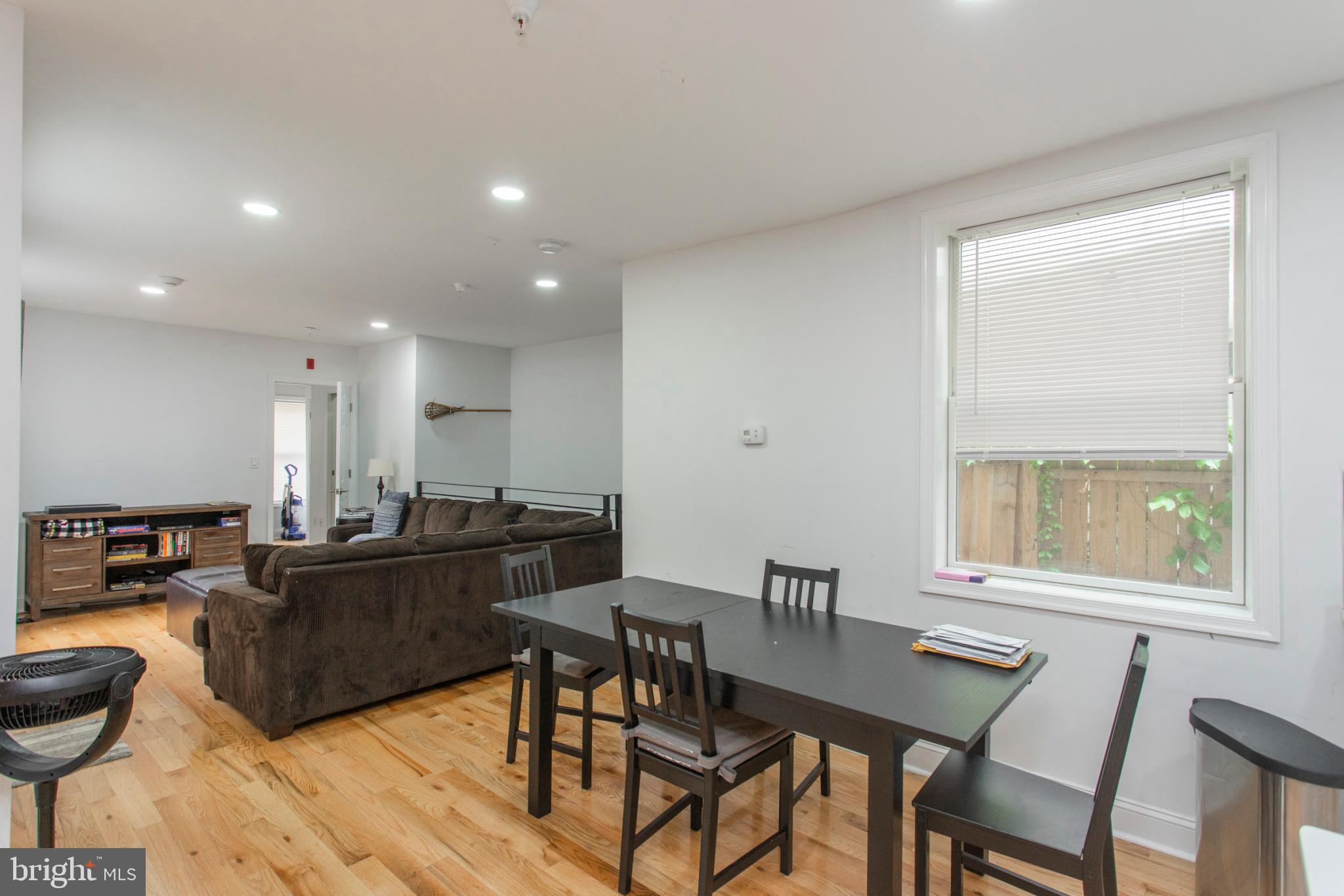 1629 Wallace Street, Unit 1R Philadelphia, PA 19130 - Photo 7 of 22 a view of a dining room with furniture window and outside view