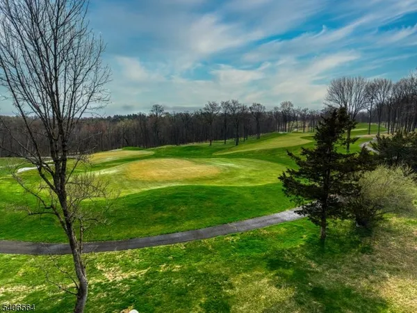 a view of a golf course with a yard