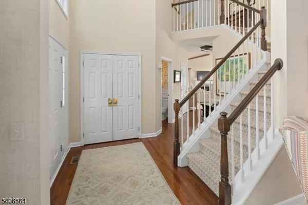 an entryway view with staircase