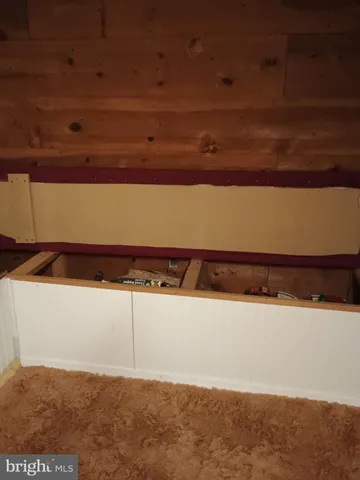 a view of a room with an empty space