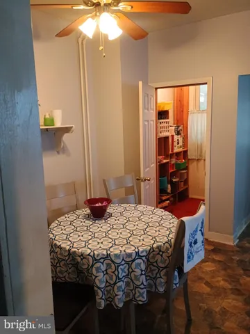 a bedroom with a bed and dresser