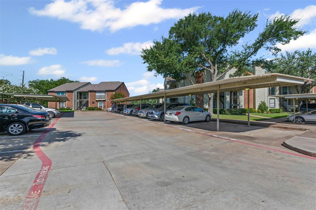 5981 Arapaho Road, Unit 703 Dallas, TX 75248 - Photo 19 of 19 View of partially covered parking lot