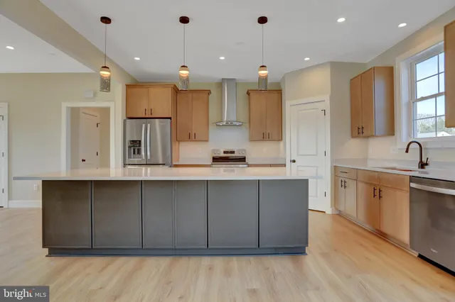 a large kitchen with cabinets