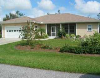 759 Devon Road Venice, FL 34293 - Photo 1 of 1 a front view of a house with a yard and potted plants