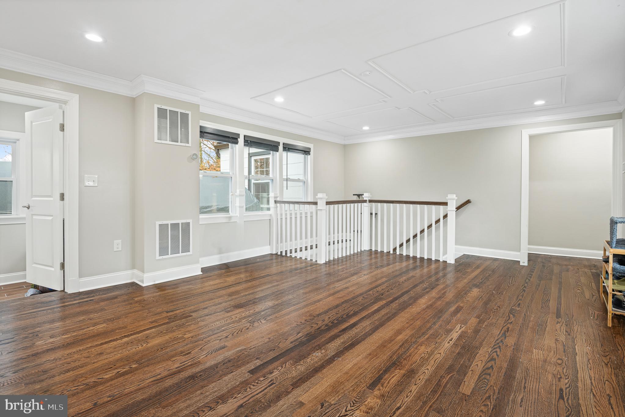 9217 Fowler Lane Lanham, MD 20706 - Photo 7 of 80 a view of wooden floor and windows in a room