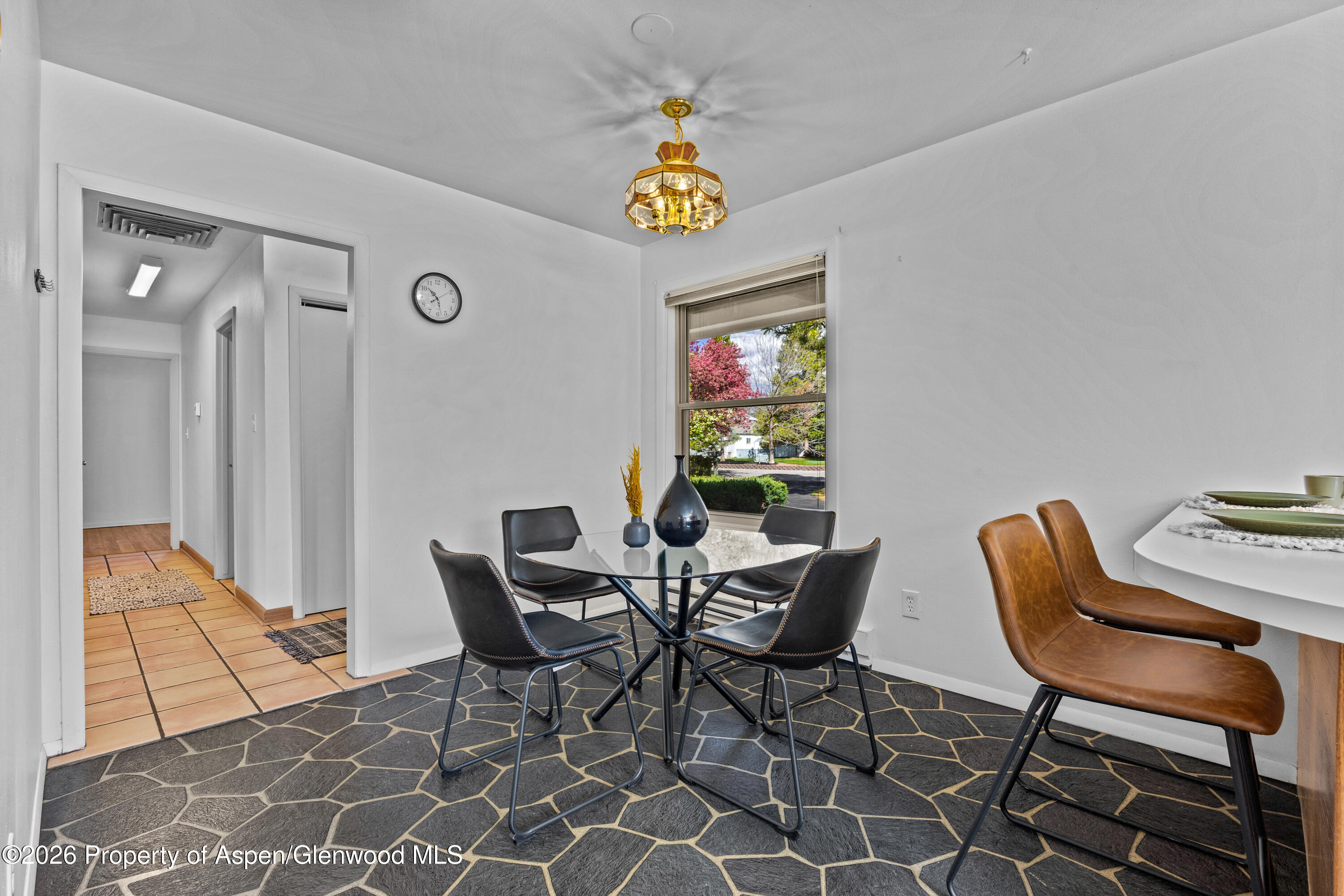 128 Hopi Carbondale, CO 81623 - Photo 16 of 34 a view of a dining room with furniture and a window
