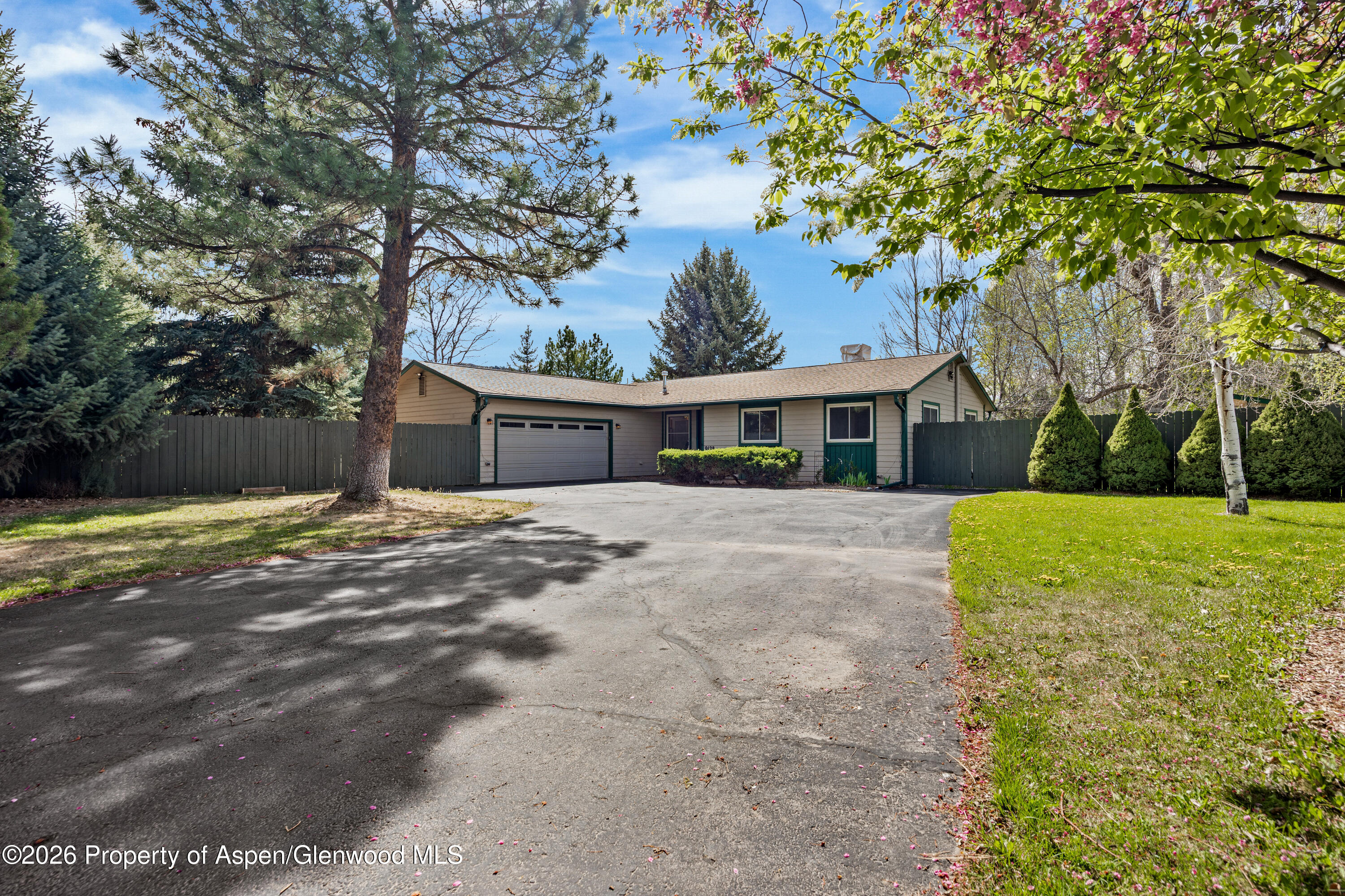 128 Hopi Carbondale, CO 81623 - Photo 34 of 34 a front view of house with yard and trees