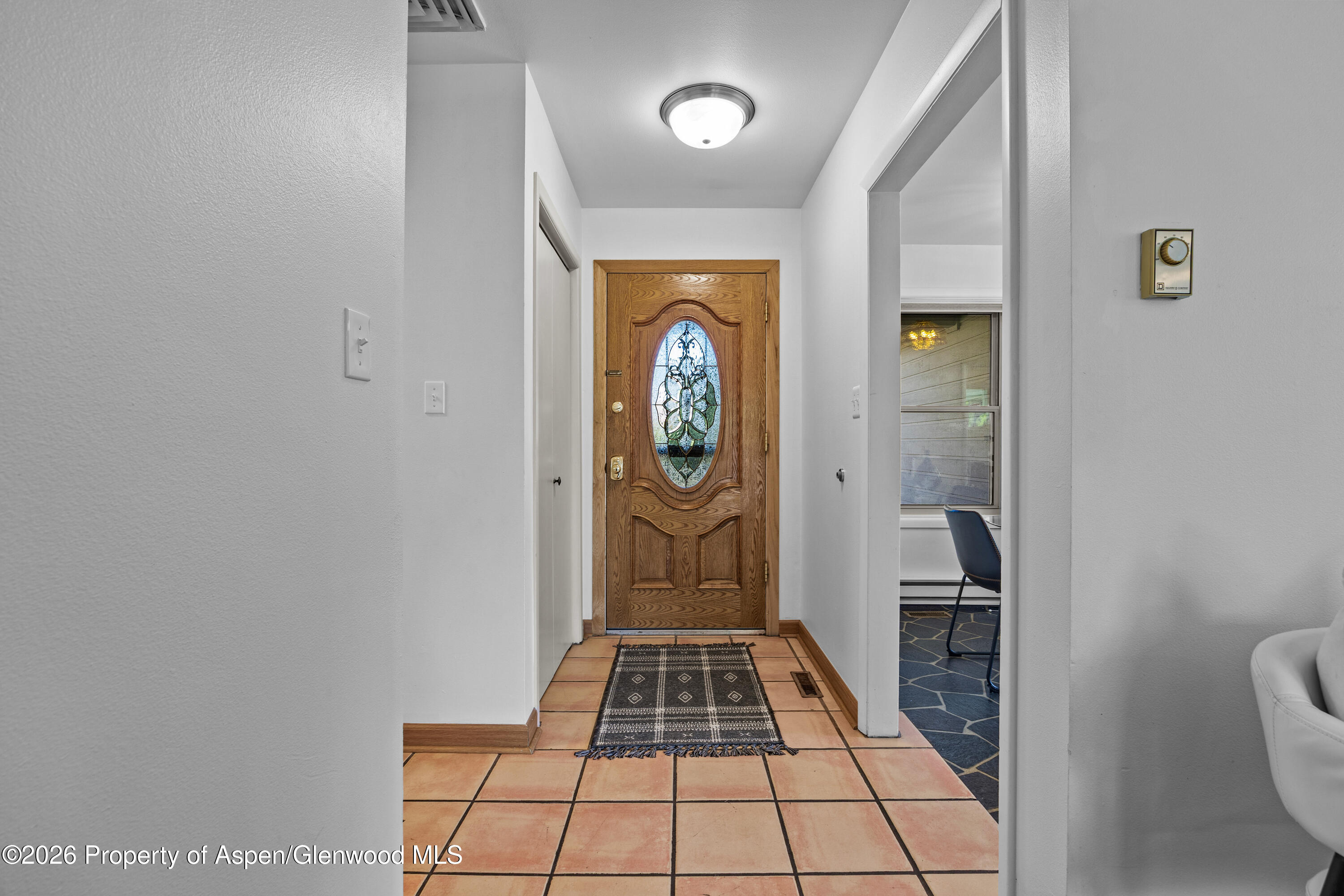 128 Hopi Carbondale, CO 81623 - Photo 5 of 34 a view of an entryway with wooden floor